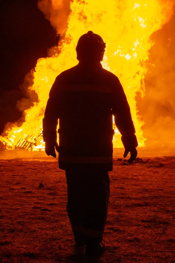 A fireman watching a fire